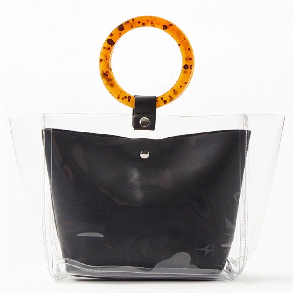 Clear tote with tortoise handles
